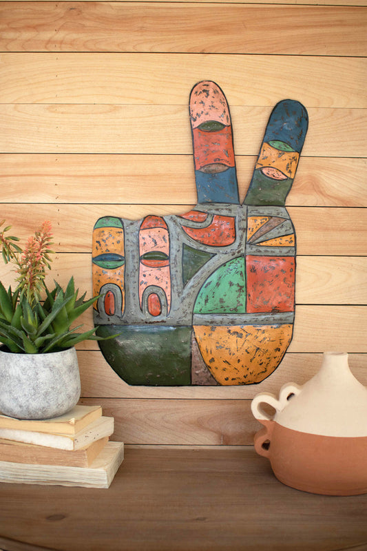 A Painted Metal Peace Sign Hand Wall Hanging